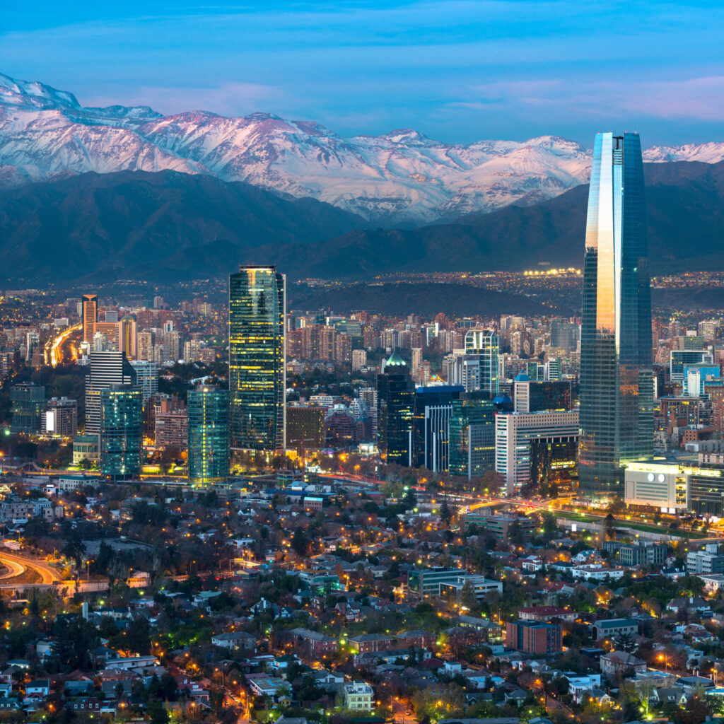 Panoramic view of Providencia and Las Condes districts with Costanera Center skyscraper, Titanium Tower and Los Andes Mountain Range, Santiago de Chile